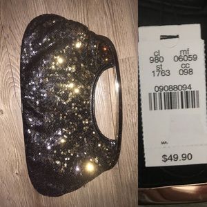 Express black and gold clutch